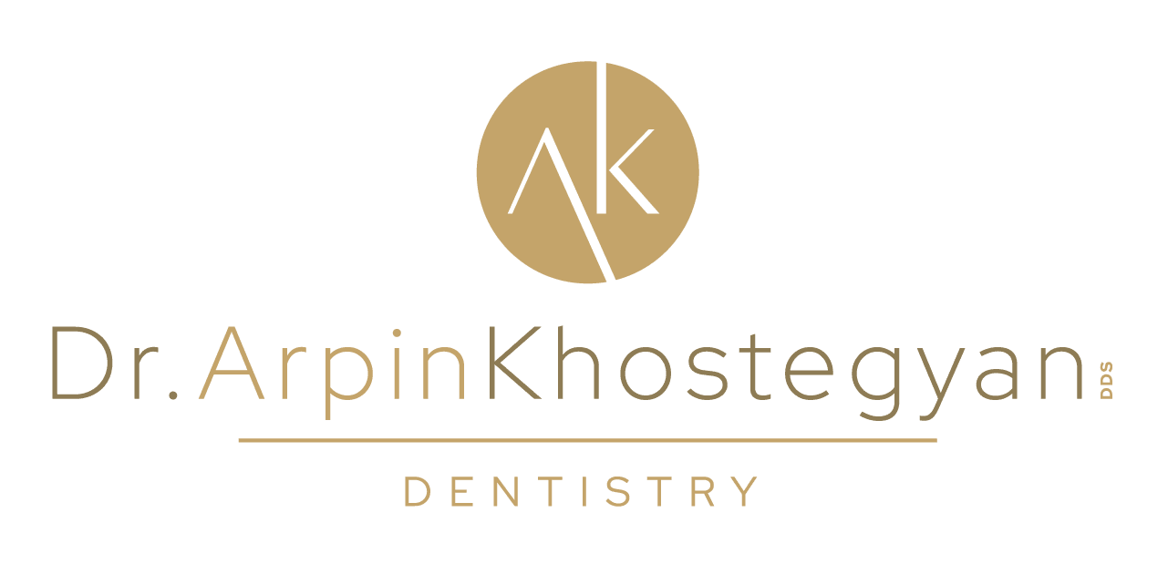 Dr. Arpin Khostegyan DDS dentistry logo on green background